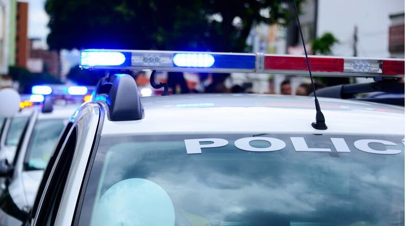 A woman was critically injured after she landed on the roof of a house after she was ejected from a car Monday afternoon.