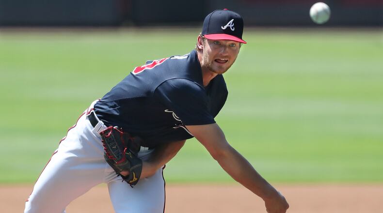 Braves pitcher Mike Soroka delivers a pitch during live batting practice at the first workout of summer Camp Friday, July 3, 2020, at Truist Park in Atlanta.