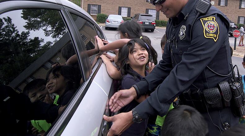 Bhutanese refugee Ryan Koirala is a police officer in Clarkston. Koirala’s was the leadoff story in our series on the “New Americans,” immigrants in Atlanta. Ryon Horne / rhorne@ajc.com