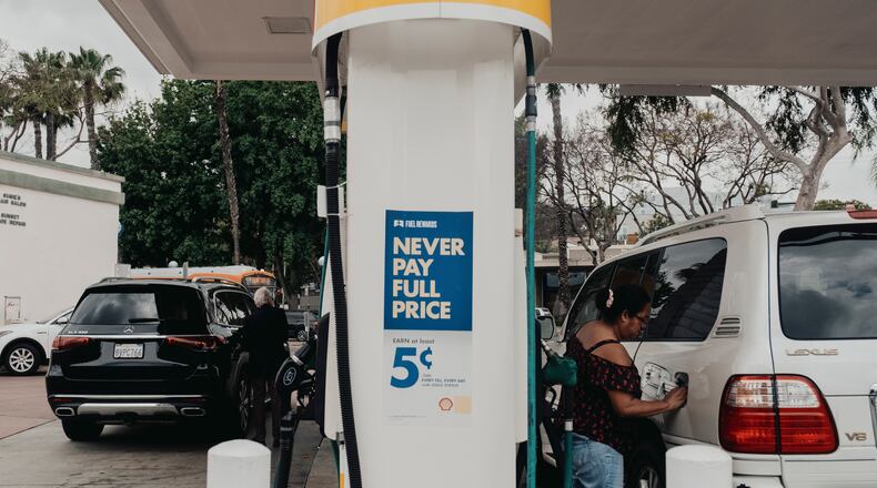 A gas station in Los Angeles, just days ahead of the Memorial Day weekend, May 25, 2023. A stronger supply of oil and weaker-than-expected demand have helped lower gasoline prices, experts say, with some travelers saving hundreds of dollars. Mark Abramson/The New York Times