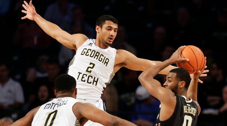 Georgia Tech's Chris Bolden, top, defends against Wake Forest's Devin Thomas, right, with help from teammate Charles Mitchell, left, in the second half of an NCAA college basketball game, Saturday, Feb. 7, 2015, in Atlanta. (AP Photo/David Goldman) Georgia Tech guard Chris Bolden helped limit Wake Forest guard Codi Miller-Mcintyre to seven points, almost 11 points under his ACC average. (ASSOCIATED PRESS)
