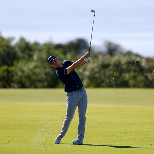 Justin Rose, of England, hits from the 17th fairway while playing the South Course at Torrey Pines during the second round of the Farmers Insurance Open golf tournament Friday, Jan. 30, 2026, in San Diego. (AP Photo/Caroline Brehman)