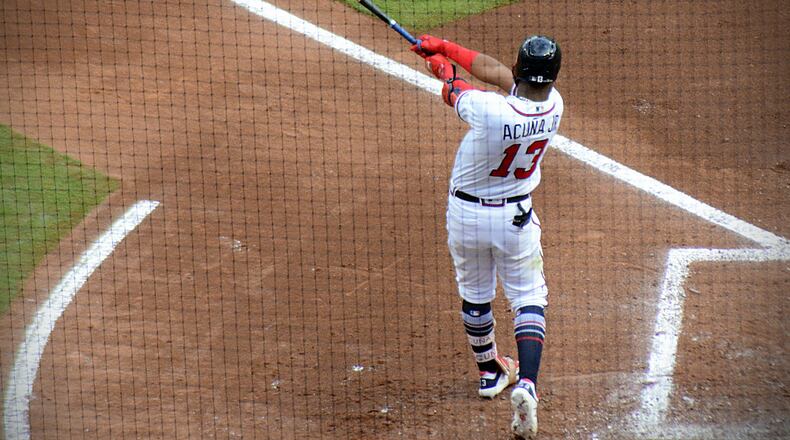 Ronald Acuna Jr. takes a practice swing before stepping into the batters box on Monday, Oct. 8, 2018 at SunTrust Park. The Braves faced the Dodgers in Game Four of the NLDS.