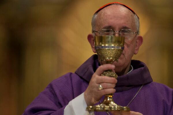 FILE - Archbishop of Buenos Aires, Cardinal Jorge Mario Bergoglio leads a mass at the Metropolitan Cathedral in Buenos Aires, Argentina, Thursday, Feb. 14, 2013. (AP Photo/Natacha Pisarenko, file)