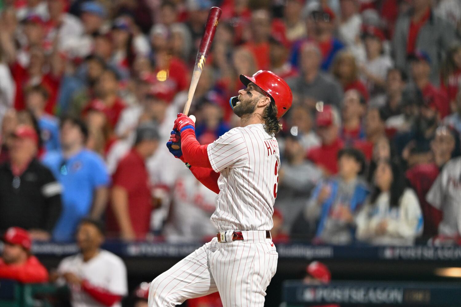 Philadelphia Phillies’ Bryce Harper hits a home run against the Atlanta Braves, his second homer of the evening, during the sixth inning of NLDS Game 3 in Philadelphia on Wednesday, Oct. 11, 2023.   (Hyosub Shin / Hyosub.Shin@ajc.com)