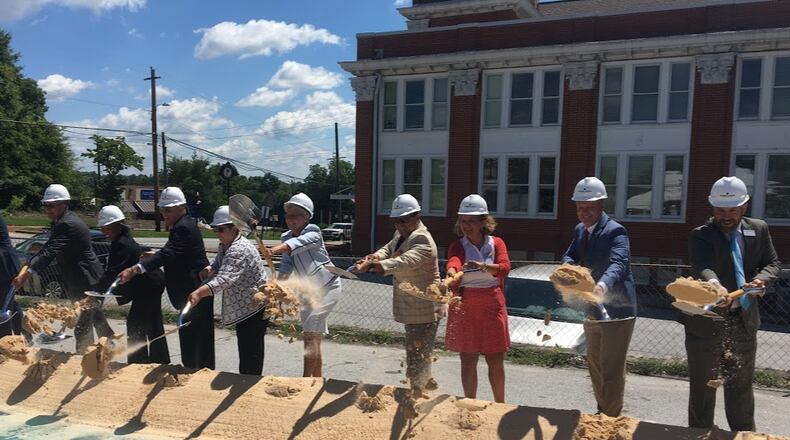 Lawrenceville officials and Aurora Theater leaders celebrated the groundbreaking of the Lawrenceville Performing Arts Center on Thursday. (Amanda C. Coyne/AJC)
