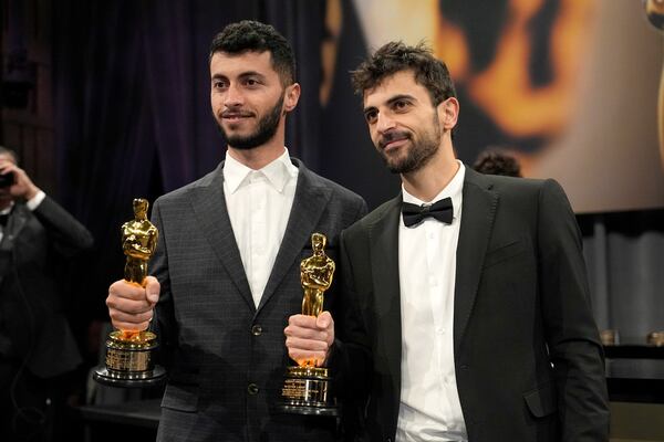 FILE - Basel Adra, left, and Yuval Abraham, winners of the award for best documentary feature film for "No Other Land," the Governors Ball after the Oscars on Sunday, March 2, 2025, in Los Angeles. (AP Photo/John Locher, File)