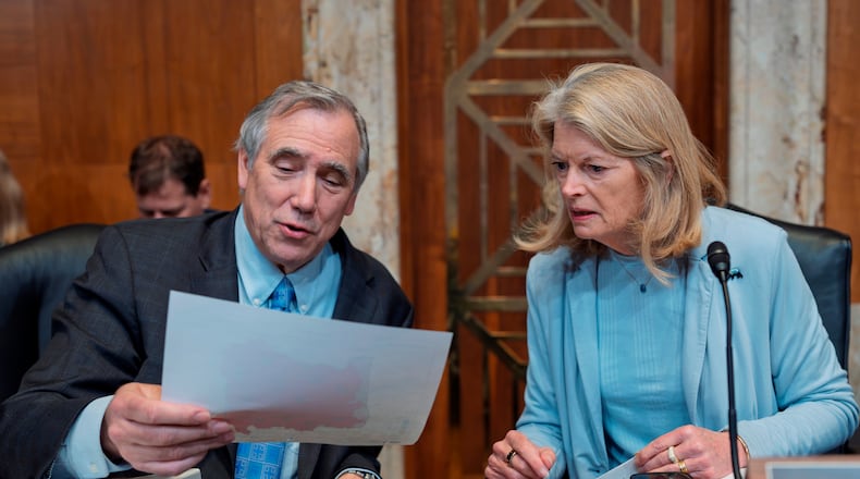 Sen. Jeff Merkley, D-Ore., the ranking member, and Sen. Lisa Murkowski, R-Alaska, chair of the Senate Appropriations Subcommittee on Interior, Environment, and Related Agencies, prepare to hear from U.S. Forest Service Chief Tom Schultz on his 2027 budget request, at the Capitol in Washington, Thursday, April 30, 2026. (AP Photo/J. Scott Applewhite)