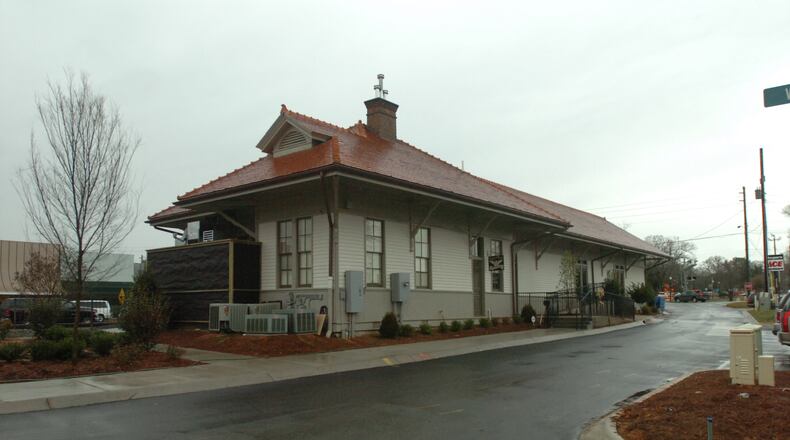 070105 - Woodstock, GA -- The old historic train depot in downtown Woodstock shown on Friday January 5, 2007. Woodstock and the train depot was selected by Republican George Bush as the place to kick off his 1992 presidential re-election campaign. The rally drew 25,000 people. (FRANK NIEMEIR / AJC Staff)