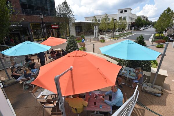 Avalon, a mixed-use development in Alpharetta, received nearly $2.6 million in property tax breaks last year. Customers visit Avalon’s theater, restaurants and stores on Thursday, August 17, 2017. HYOSUB SHIN / HSHIN@AJC.COM