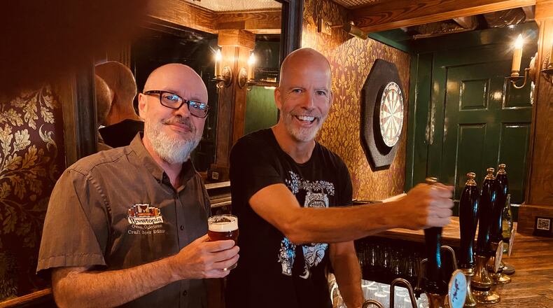 Brewtopia Events’ Owen Ogletree and Brick Store Pub co-owner Dave Blanchard at the Brick Store Cask Bar. 
(Bob Townsend for The Atlanta Journal-Constitution)