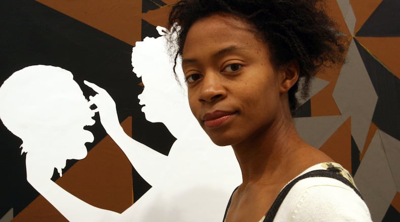 Kara Walker’s “The Jubilant Martyrs of Obsolescence and Ruin,” a 60-foot-wide mural of cut-paper satire, is among the newly acquired works that the High Museum will exhibit this year. TINA FINEBERG / ASSOCIATED PRESS