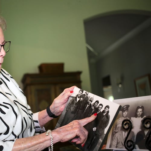 June West Brandt, 93, holds a photo displaying her brother, William Durham West Jr., who was killed in World War II, Aug. 27, 2025, in Richmond, Texas. (AP Photo/Lekan Oyekanmi)