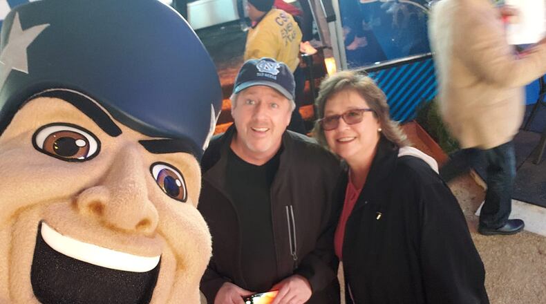 Kent and Laura Fite yuck it up with the New England Patriots mascot last week during Super Bowl festivities. The North Carolina couple won tickets for the game from Pepsi.