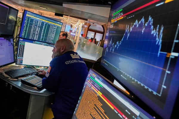 Specialist Meric Greenbaum works at his post on the floor of the New York Stock Exchange, Tuesday, June 10, 2025. (AP Photo/Richard Drew)