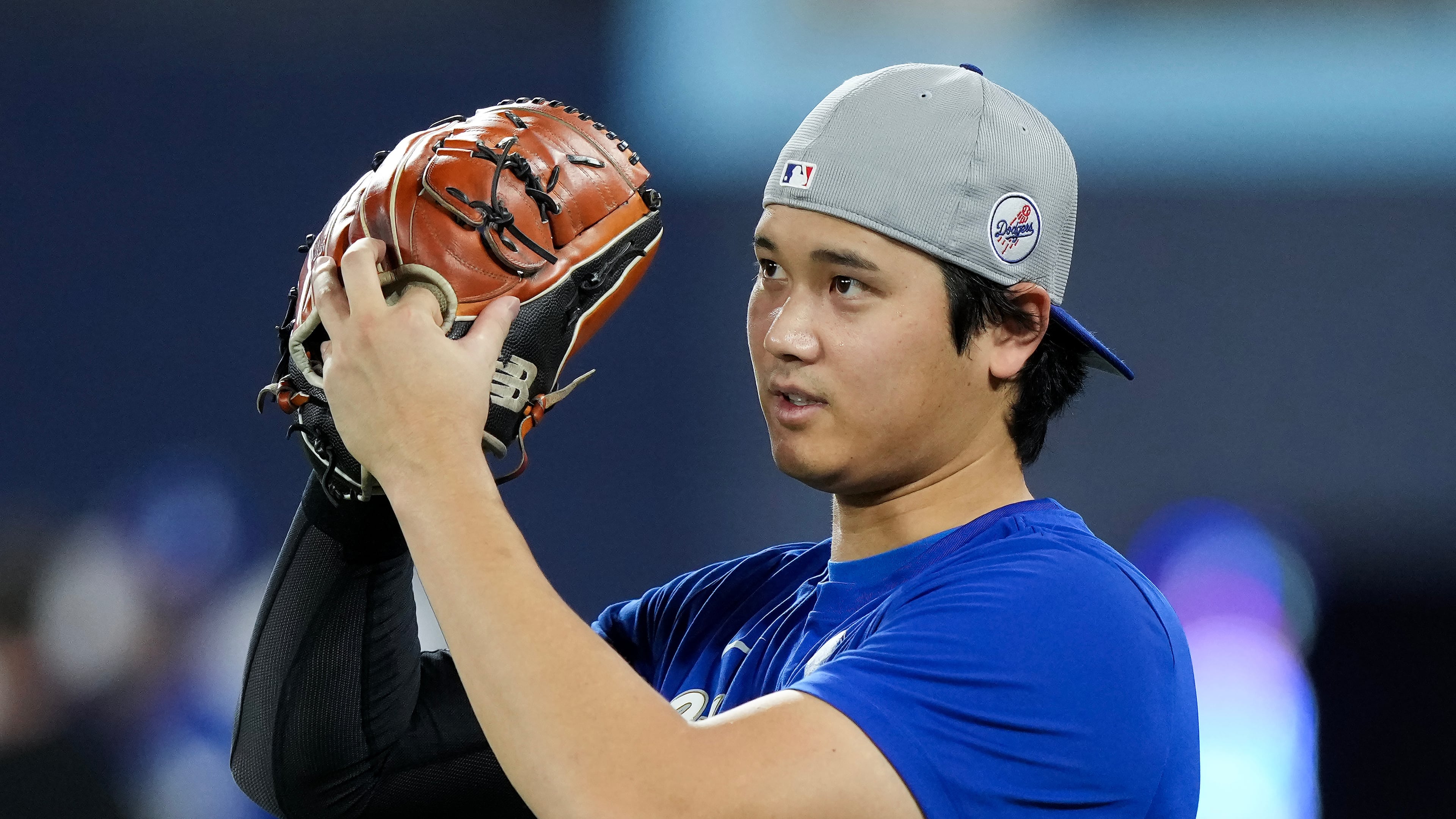 Los Angeles Dodgers' Shohei Ohtani rehearses his pitch during batting practice ahead of game 6 of the World Series against the Los Angeles Dodgers in Toronto on Thursday, Oct. 30, 2025. (/Nathan Denette/The Canadian Press via AP)