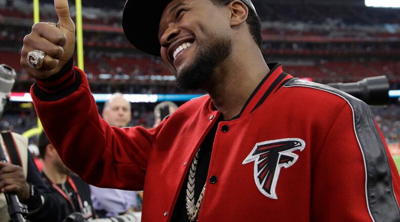 Usher poses for photos before the NFL Super Bowl 51 football game between the New England Patriots and the Atlanta Falcons, Sunday, Feb. 5, 2017, in Houston. (AP Photo/Jae C. Hong)