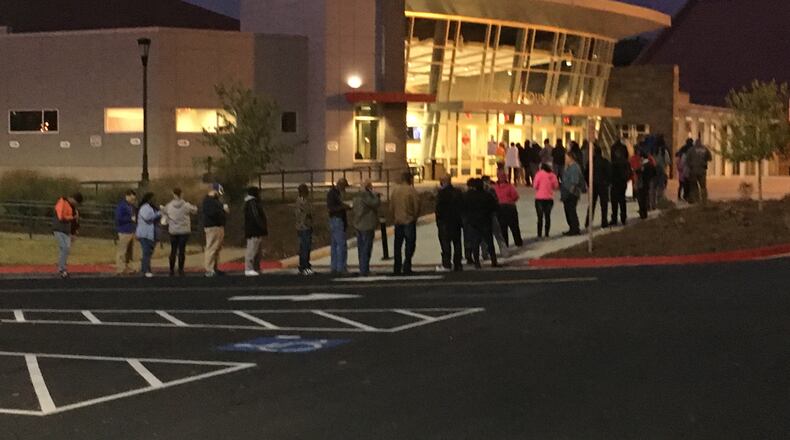 A line of about 50 voters wait at 6:45 a.m. on Election Day at the Cobb County Civic Center.