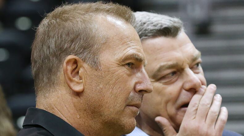 Actor Kevin Costner and Hawks owner Tony Ressler look on before the Hawks' second-round playoff game against Cleveland Sunday at Philips Arena, which turned out to be their final game of the season. (Curtis Compton/ccompton@ajc.com)