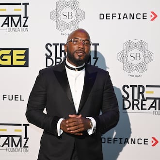 Jeezy poses for photographers upon arrival for Jeezy’s fifth annual Sno Ball at Delta Flight Museum, Thursday, Oct. 9, 2025, in Atlanta. (Hyosub Shin/AJC)