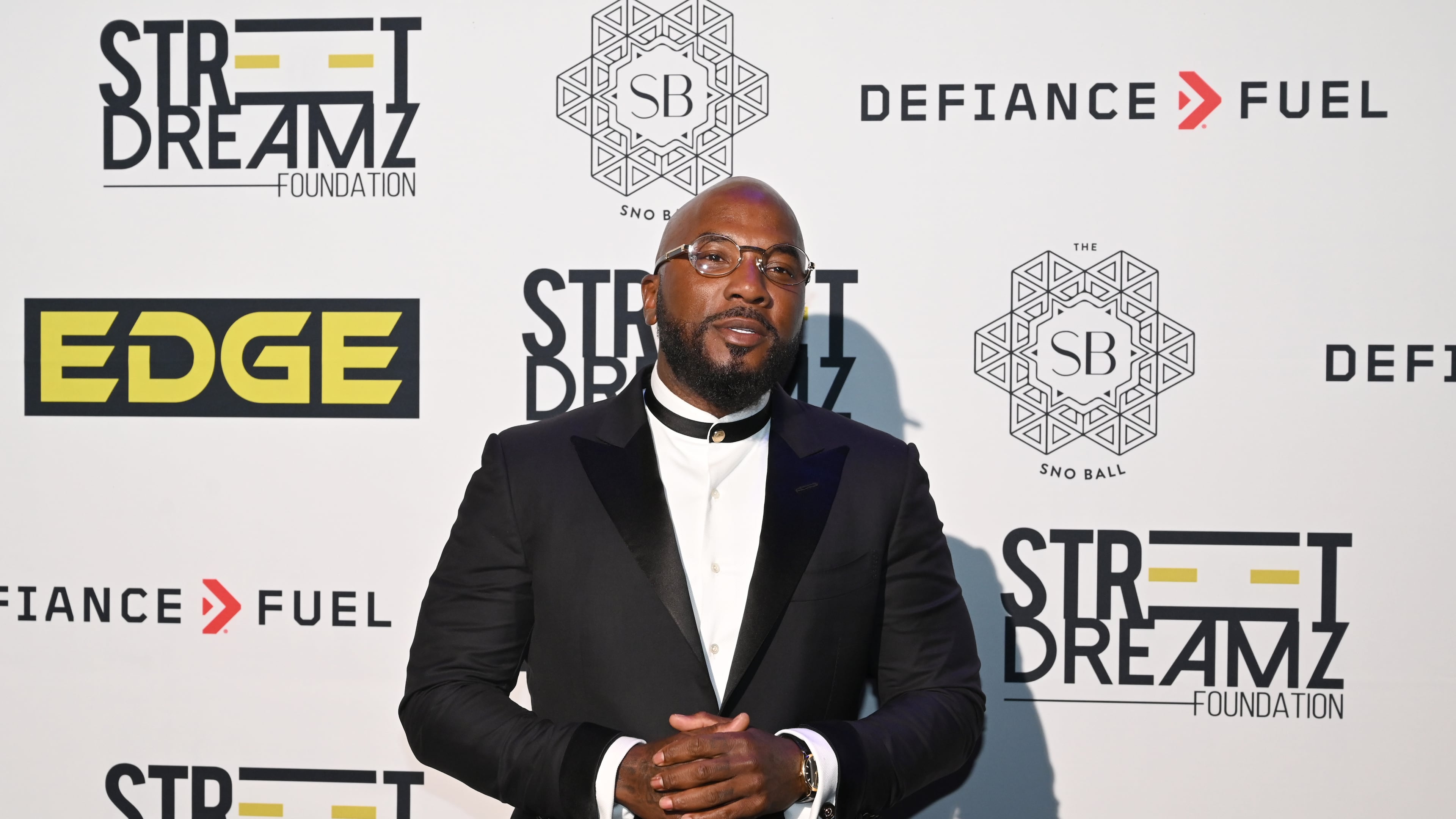 Jeezy poses for photographers upon arrival for Jeezy’s fifth annual Sno Ball at Delta Flight Museum, Thursday, Oct. 9, 2025, in Atlanta. (Hyosub Shin/AJC)