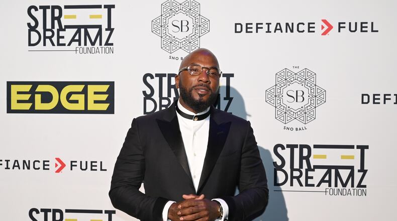 Jeezy poses for photographers upon arrival for Jeezy’s fifth annual Sno Ball at Delta Flight Museum, Thursday, Oct. 9, 2025, in Atlanta. (Hyosub Shin/AJC)