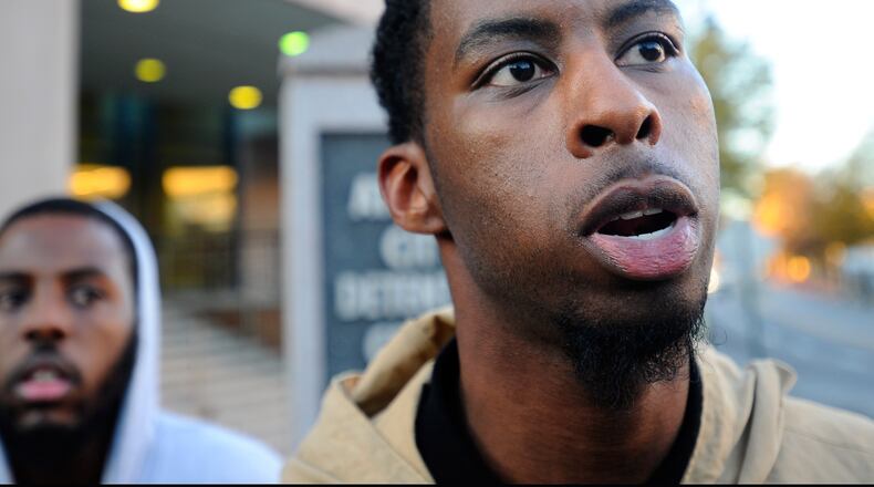 After spending the night in jail, Morehouse double major Ronald Comeaux describes how he was arrested while marching downtown during protests in the wake of the grand jury decision not to indict Ferguson, Missouri police officer Darren Wilson for the Mike Brown shooting, on Wednesday, Nov. 26, 2014, in Atlanta. DAVID TULIS / AJC SPECIAL
