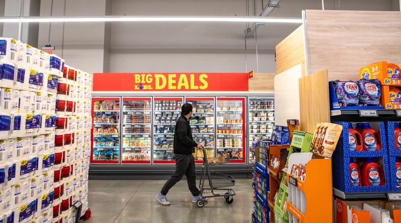 A customer shops at a Lidl grocery store in West Midtown on Wednesday, Oct 22, 2025. (Jenni Girtman for the AJC)