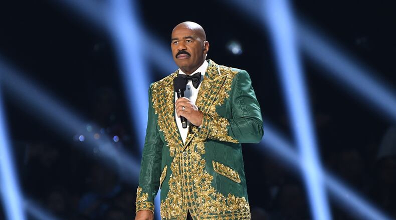 ATLANTA, GEORGIA - DECEMBER 08: (EDITORIAL USE ONLY) Steve Harvey speaks onstage during 2019 Miss Universe Pageant at Tyler Perry Studios on December 08, 2019 in Atlanta, Georgia. (Photo by Paras Griffin/Getty Images)