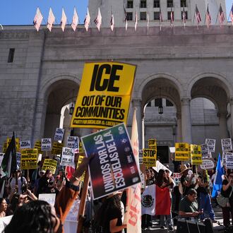 FILE - People gather on the steps of Los Angeles City Hall during a protest on Jan. 30, 2026 in Los Angeles. (AP Photo/Jae C. Hong, File)