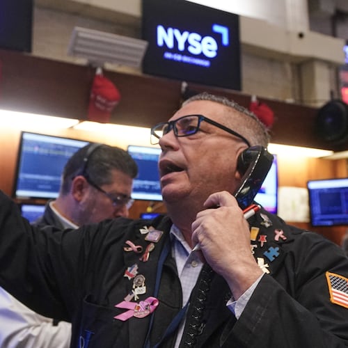 Trader Jonathan Mueller works on the floor of the New York Stock Exchange, Tuesday, Nov. 18, 2025. (AP Photo/Richard Drew)