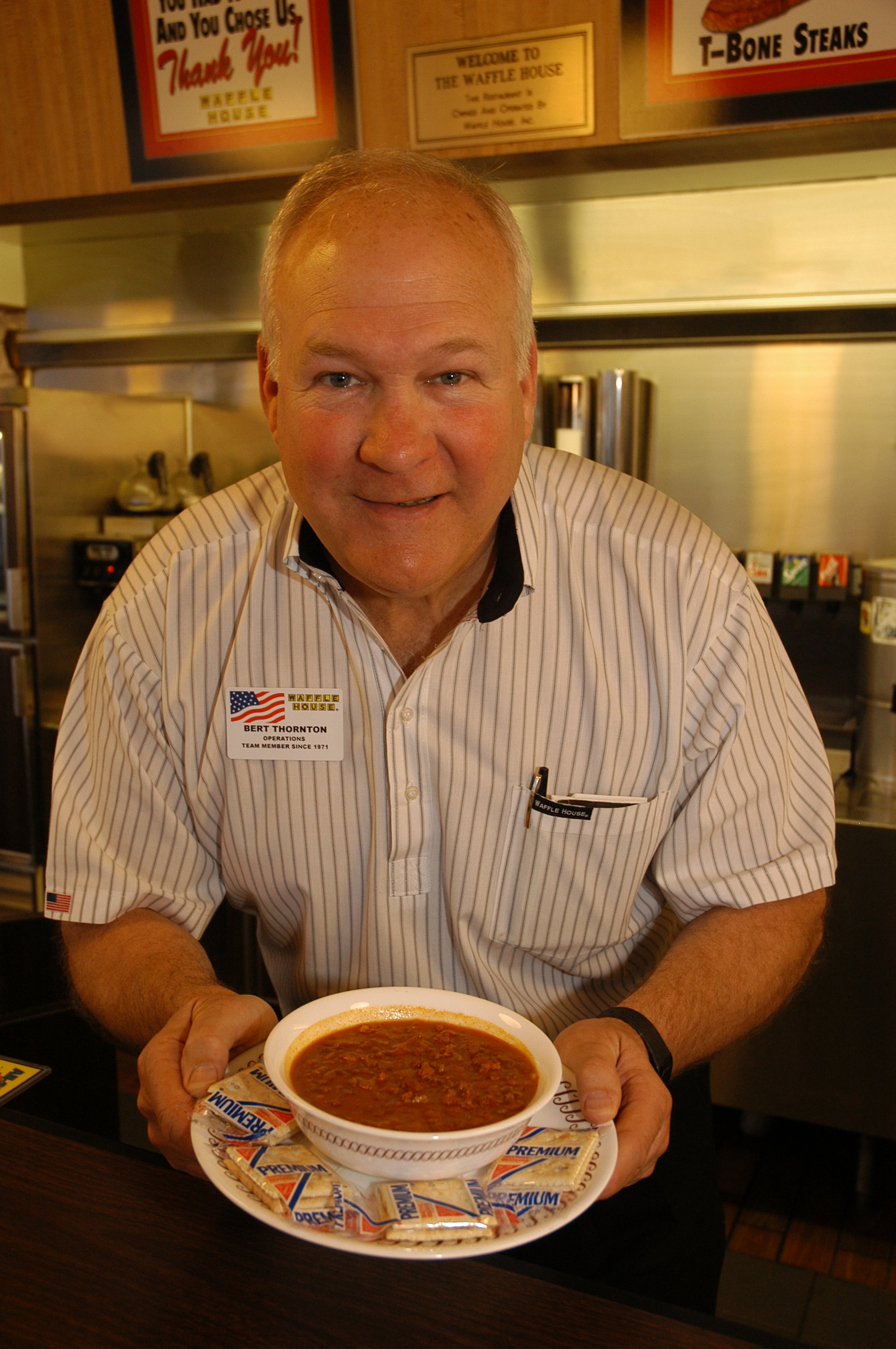1980s: Bert Thornton holds a bowl of his namesake chili that became a cult favorite.