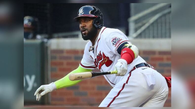 Outfielder Marcell Ozuna entered into a pretrial diversion program that could result in the dismissal of his domestic violence charges.