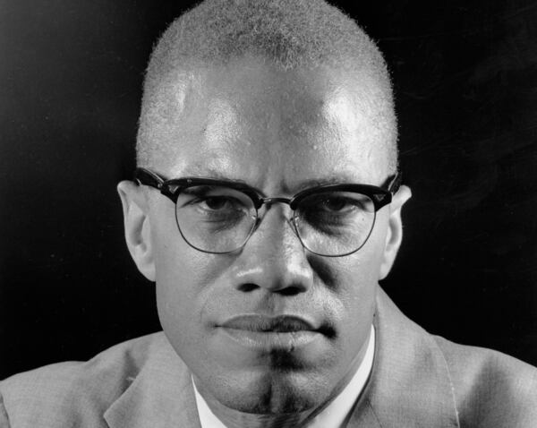 FILE - In this March 5, 1964, file photo, Muslim leader Malcolm X poses during an interview in New York. One of the last major digital holdouts, “The Autobiography of Malcolm X,” should soon be available as an e-book, the attorney for the late activist’s estate told The Associated Press in 2015. Eddie Adams,/AP 1964