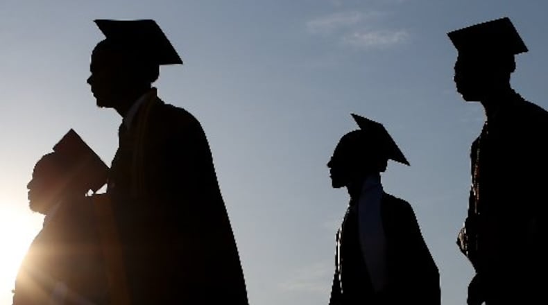 DeKalb County School District students won’t receive their diplomas in 2019 until after Memorial Day, the week after the school year ends. (AJC FILE PHOTO)