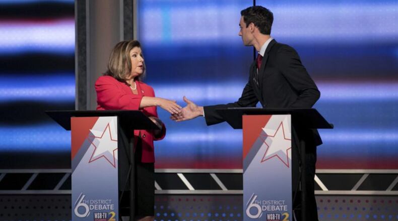 Former Georgia GOP Secretary of State Karen Handel, left, and her Democratic opponent, Jon Ossoff, squared off in a debate Tuesday night in Atlanta. The race for the 6th district Congressional seat vacated by Health and Human Services Secretary Tom Price has drawn national attention and is seen by some as a referendum on President Donald Trump’s turbulent first months in office.