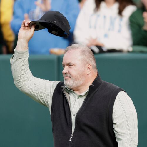 FILE - Former Green Bay Packers head coach Mike McCarthy waves during halftime of an NFL football game against the Detroit Lions Sunday, Sept. 7, 2025, in Green Bay, Wis. (AP Photo/Matt Ludtke, File)