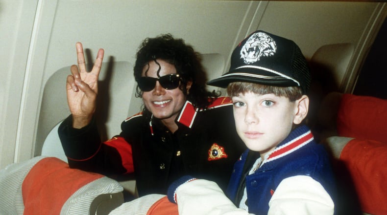 UNSPECIFIED - JULY 11: Michael Jackson with 10 year old Jimmy Suchcraft on the tour plane on 11th of July 1988.(Photo by Dave Hogan/Getty Images)