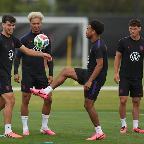 United States' Giovanni Reyna, center left, Antonee Robinson, center, and Tyler Adams practice during a training session ahead of their FIFA World Cup match against Bosnia in Irvine, Calif., Monday, June 29, 2026. (AP Photo/Andre Penner)