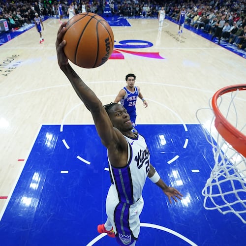Sacramento Kings' Keon Ellis goes up for a dunk during the second half of an NBA basketball game against the Philadelphia 76ers Thursday, Jan. 29, 2026, in Philadelphia. (AP Photo/Matt Slocum)