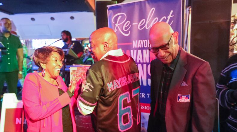 Savannah Mayor Van Johnson wears a jersey with "Mayor Johnson" printed across the back as he celebrates his re-election with former Mayors Edna Jackson and Otis Johnson on Tuesday, November 7, 2023 at Odyssey Lounge on Fairmont Avenue in Savannah.