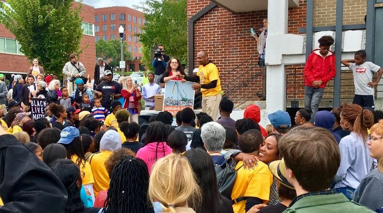 Speakers Sara Patenaude (left) and Mawuli Davis at the Beacon Municipal Center prior to Sunday’s march. From the early 20th century into the 1960s this area was the heart of Decatur’s African American community. Nearby Atlanta Avenue was once called the Auburn Avenue of Decatur. Bill Banks for the AJC