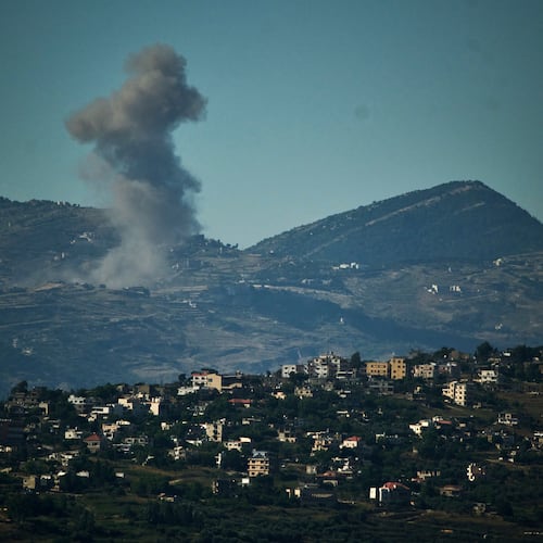 Smoke rises to the sky following an Israeli military strike in southern Lebanon as seen from northern Israel, Friday, June 19, 2026. (AP Photo/Leo Correa)