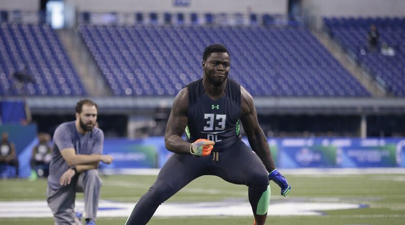 Clemson defensive lineman Shaq Lawson runs a drill at the NFL football scouting combine on Tuesday, March 1, 2016, in Indianapolis. (AP Photo/Darron Cummings)