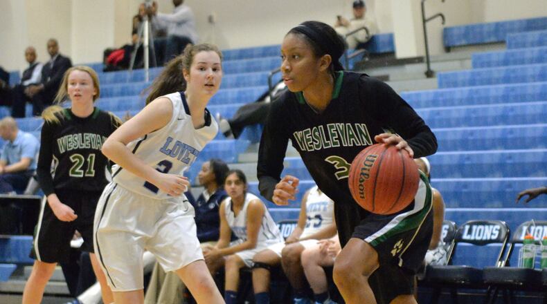 January 8, 2016 Atlanta - Wesleyan Mikayla Coombs (3) dribbles past Lovett Ellie McCollam (24) at Lovett High School on Friday, January 8, 2016. Wesleyan won 74 - 32 over the Lovett. HYOSUB SHIN / HSHIN@AJC.COM