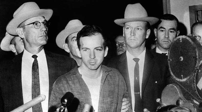 John F. Kennedy's murderer Lee Harvey Oswald during a Nov. 22, 1963, news conference after his arrest in Dallas. Oswald was killed by Jack Ruby on Nov. 24 on the eve of Kennedy's burial. (Stringer/AFP/Getty Images/TNS)