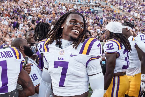 LSU linebacker Harold Perkins Jr. (7) smiles before an NCAA football game against Louisiana Tech on Saturday, Sept. 6, 2025, in Baton Rouge, La. (AP Photo/Matthew Hinton)