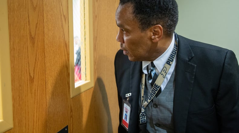 Gwinnett’s solicitor general, Brian Whiteside, peaks into a courtroom at the Gwinnett Justice and Administration Center in Lawrenceville on Friday October 11th, 2019. (Photo by Phil Skinner) AJC FILE PHOTO