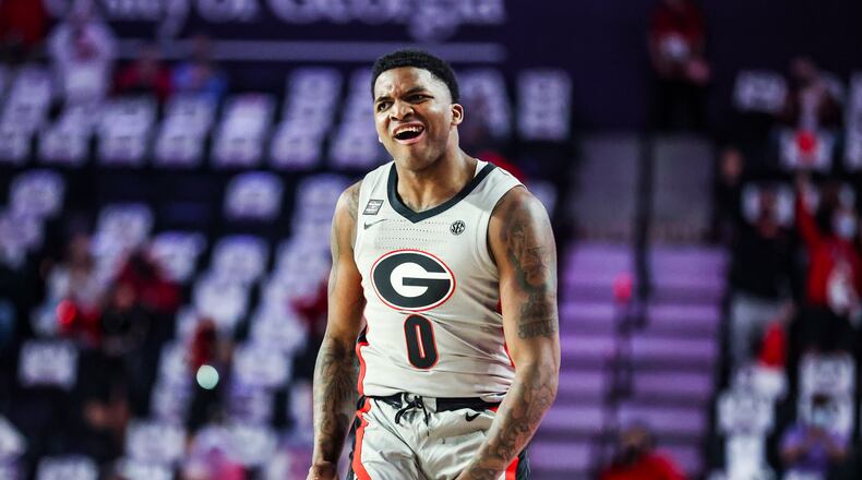 Georgia basketball player K.D. Johnson reacts after making a basket against Alabama at Stegeman Coliseum in Athens on Saturday, March 6, 2021. (Photo by Tony Walsh/UGA Athletics)