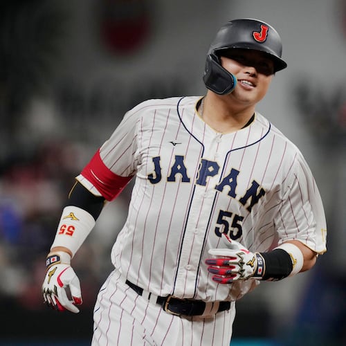FILE - Japan third baseman Munetaka Murakami (55) runs the bases after hitting a home run during the second inning of a World Baseball Classic game against the United States, Tuesday, March 21, 2023, in Miami. (AP Photo/Marta Lavandier, File)